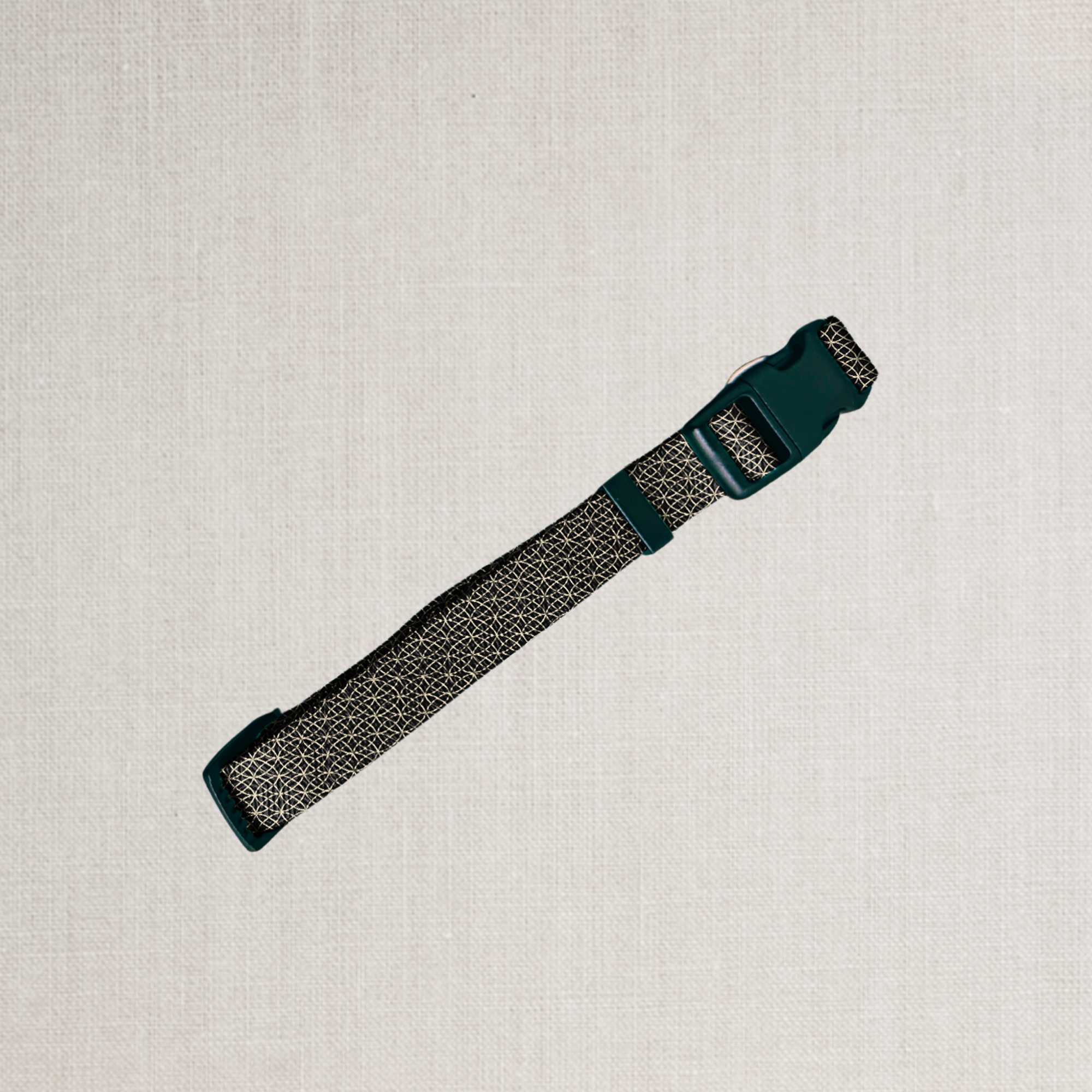 A black and gold design on dog collar